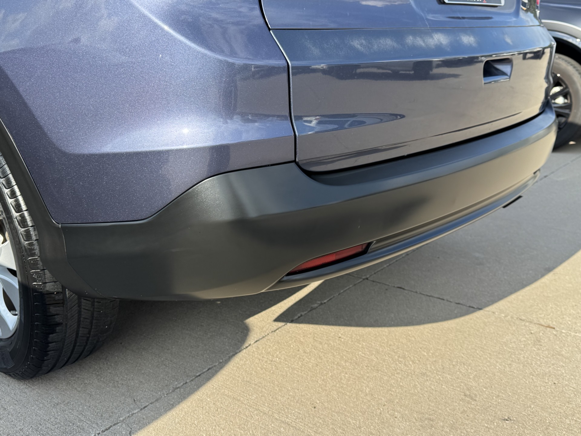 After photo of rear lower bumper restored to natural factory black