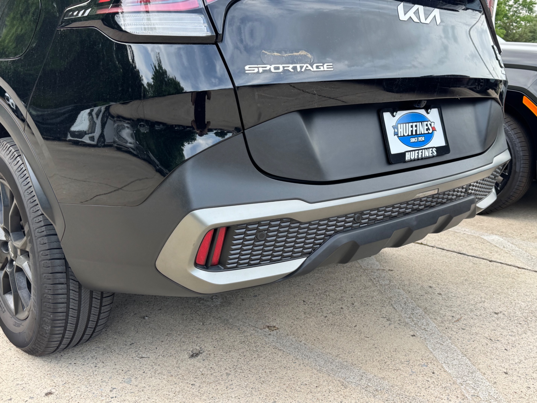 After photo of Kia Sportage rear lower bumper restored to natural factory black